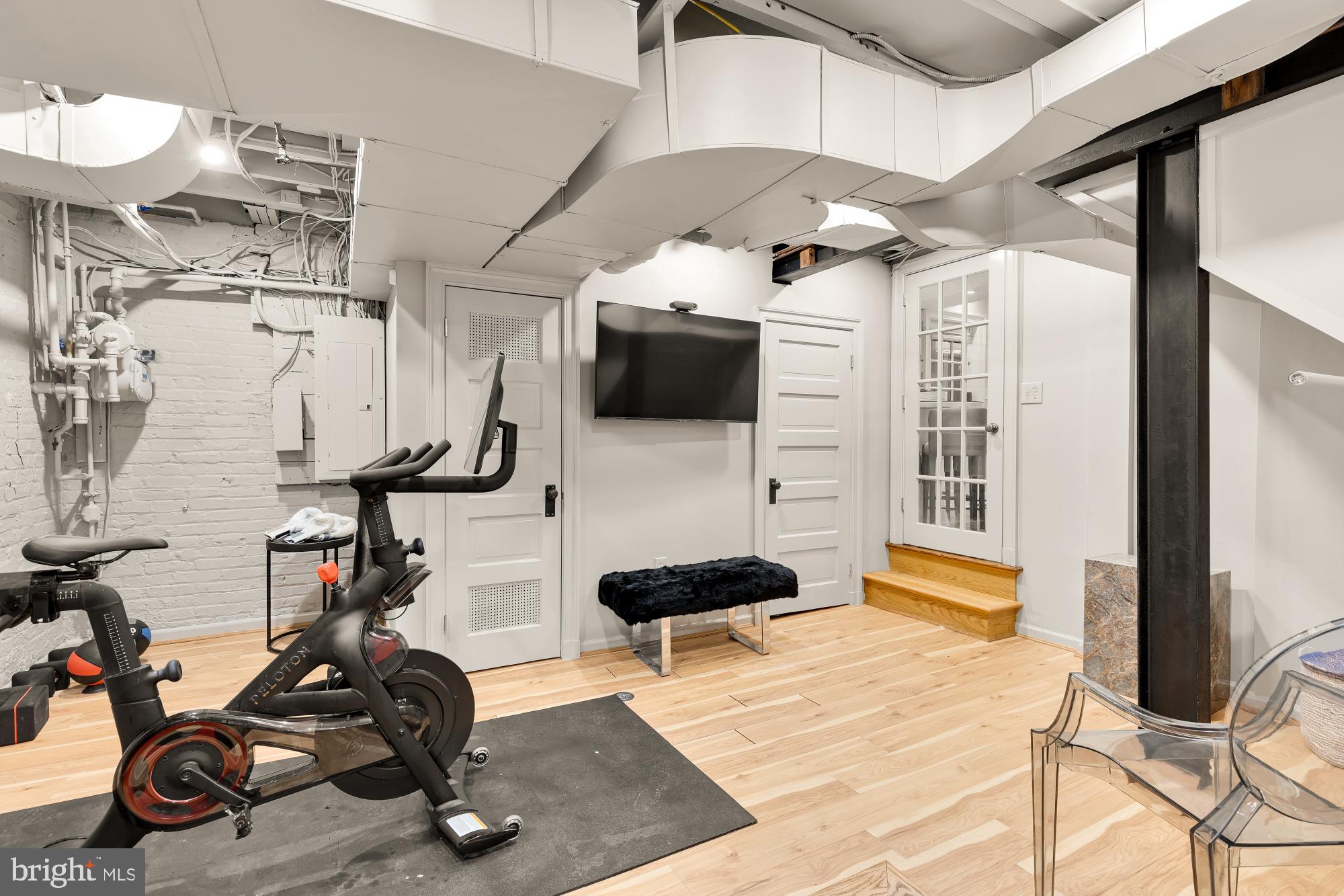 3110 Rolling Road Chevy Chase, MD 20815 - Photo 29 of 64 a view of a room with gym equipment