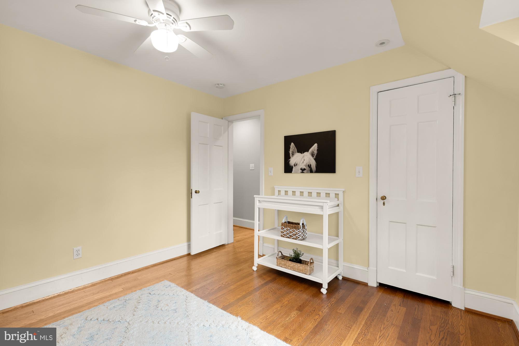 3110 Rolling Road Chevy Chase, MD 20815 - Photo 38 of 64 a view of a livingroom with wooden floor
