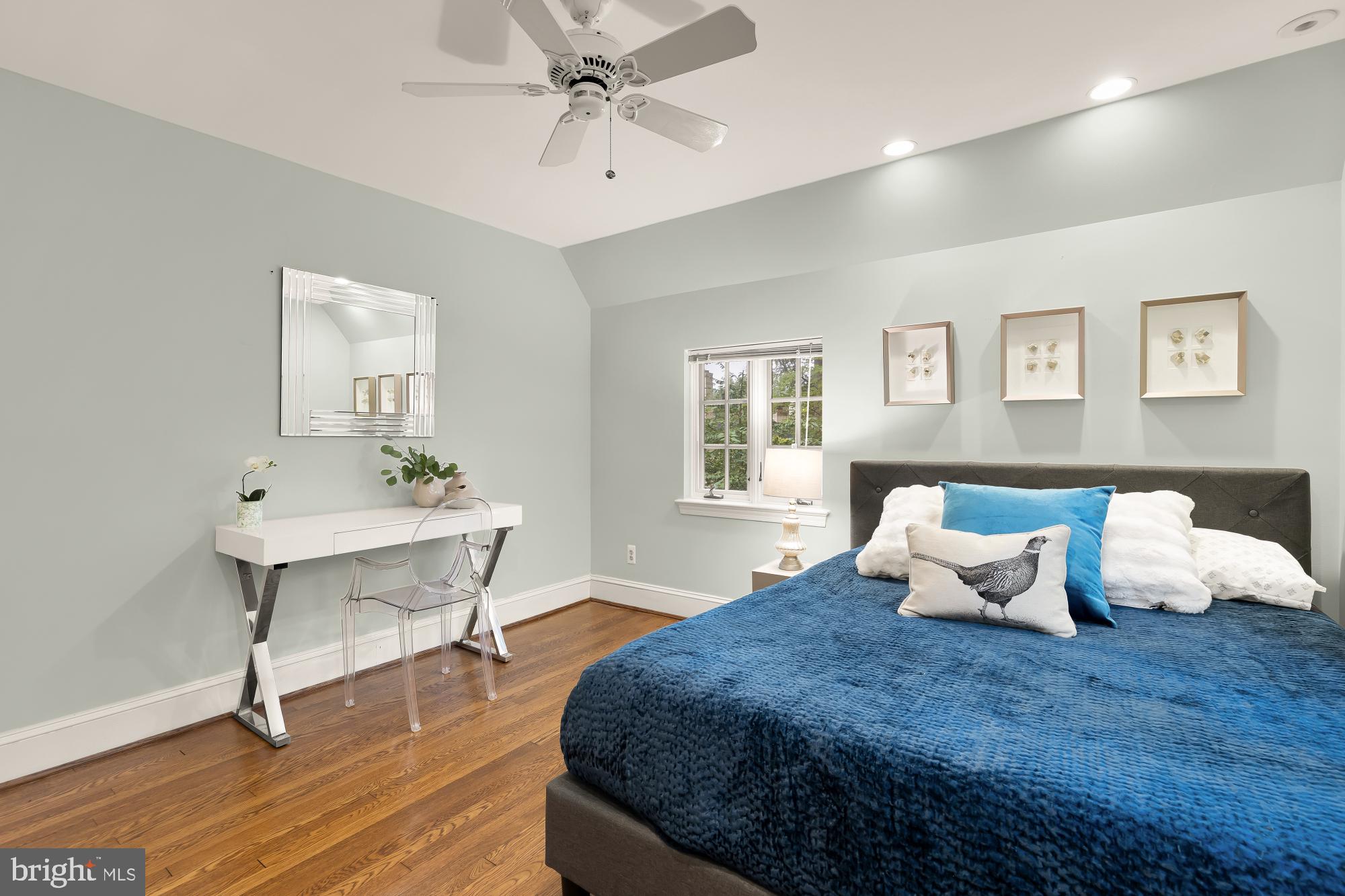 3110 Rolling Road Chevy Chase, MD 20815 - Photo 43 of 64 a bedroom with a bed and wooden floor