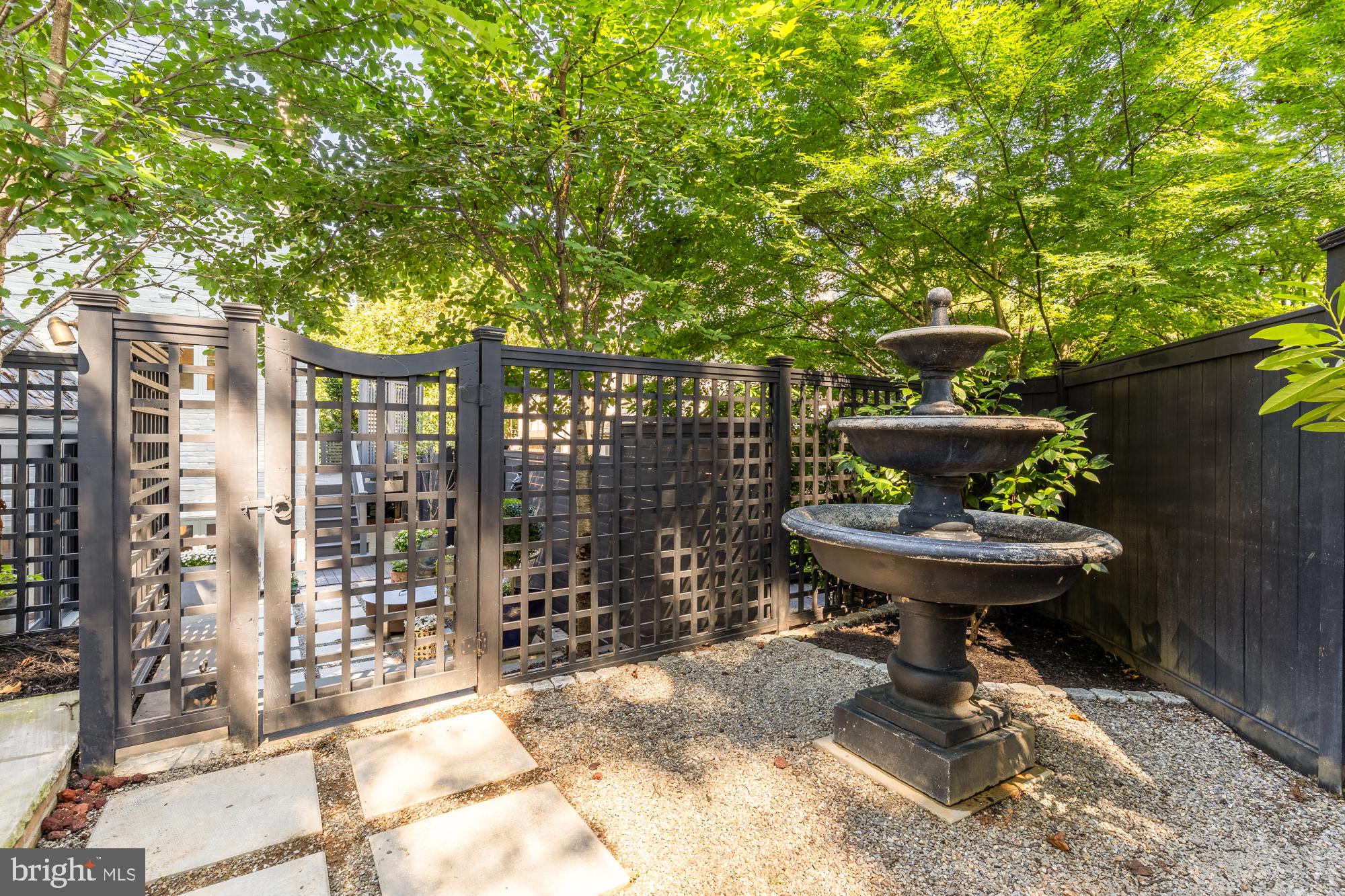 3110 Rolling Road Chevy Chase, MD 20815 - Photo 57 of 64 a view of a porch with furniture and trees