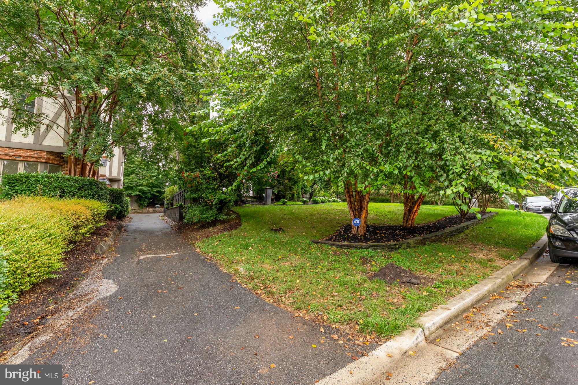 3110 Rolling Road Chevy Chase, MD 20815 - Photo 58 of 64 a view of a garden with a fountain