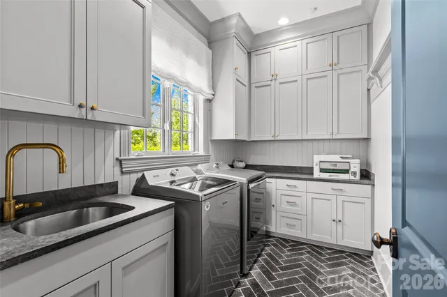 a spacious bedroom with a bed and window