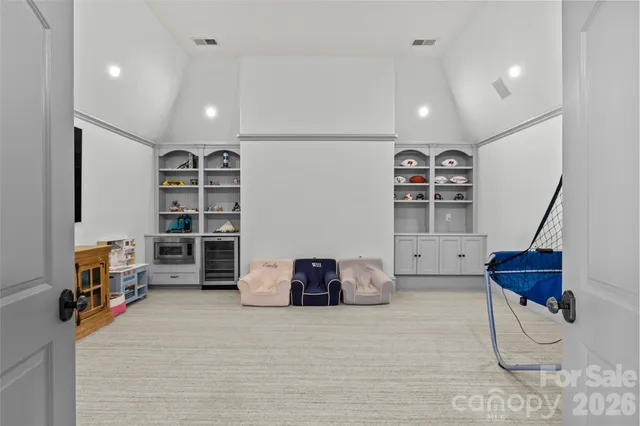 a room with furniture and stairs