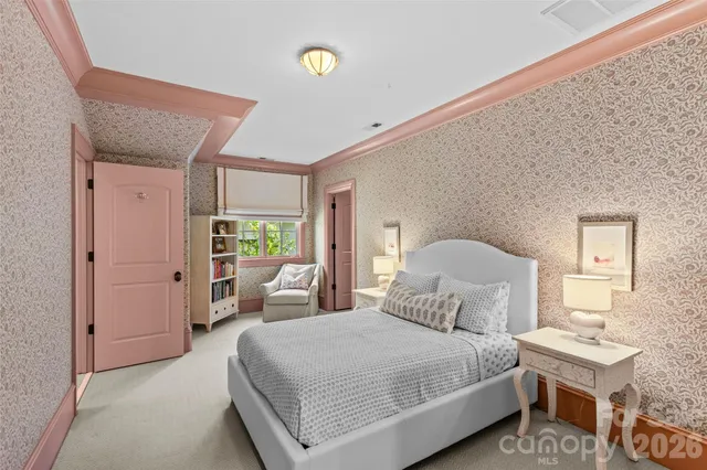 a bathroom with a double vanity sink and mirror