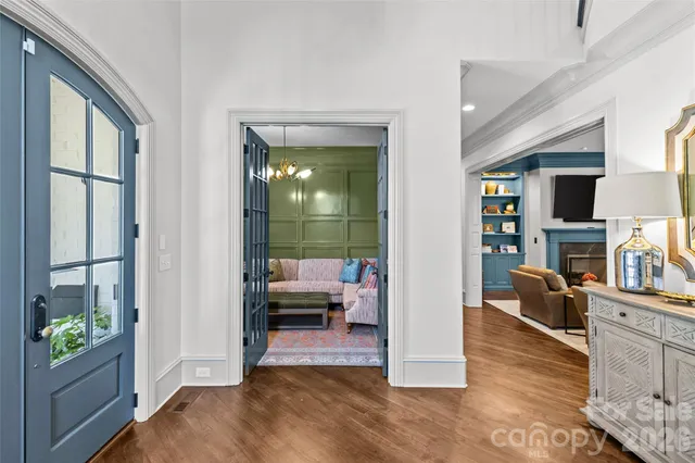 a view of a living room and dining room