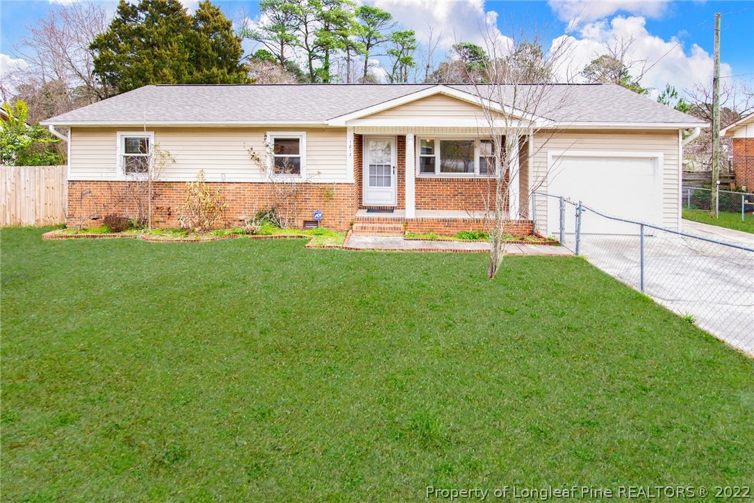 1813 Ashton Road Fayetteville, NC 28304 - Photo 1 of 25 front view of a house with a yard