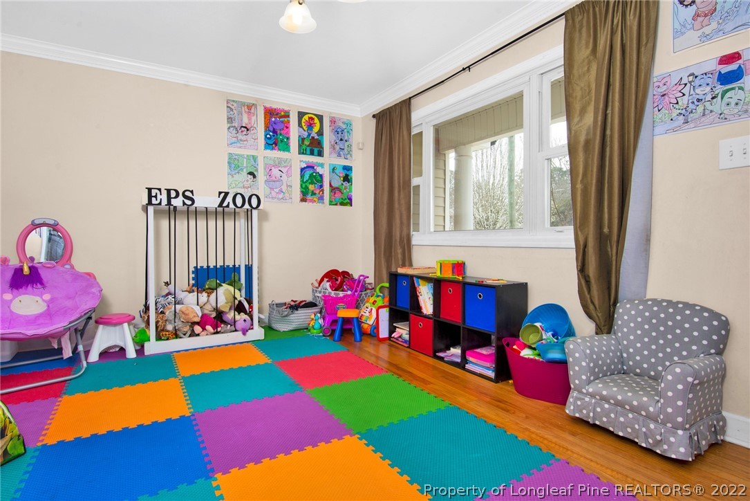 1813 Ashton Road Fayetteville, NC 28304 - Photo 18 of 25 a room with toys and a couch