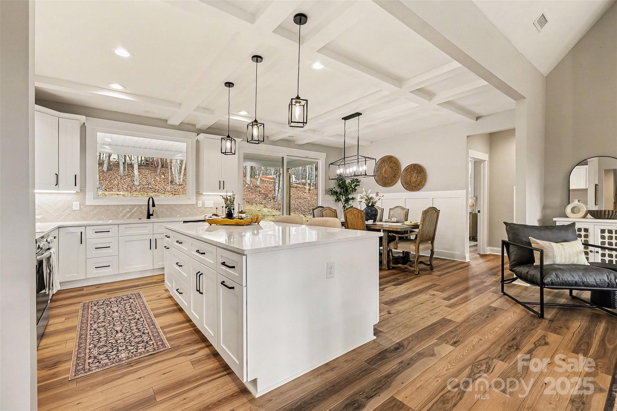 5304 West Liberty Hill Road York, SC 29745 - Photo 11 of 41 a large white kitchen with lots of counter space a sink and appliances