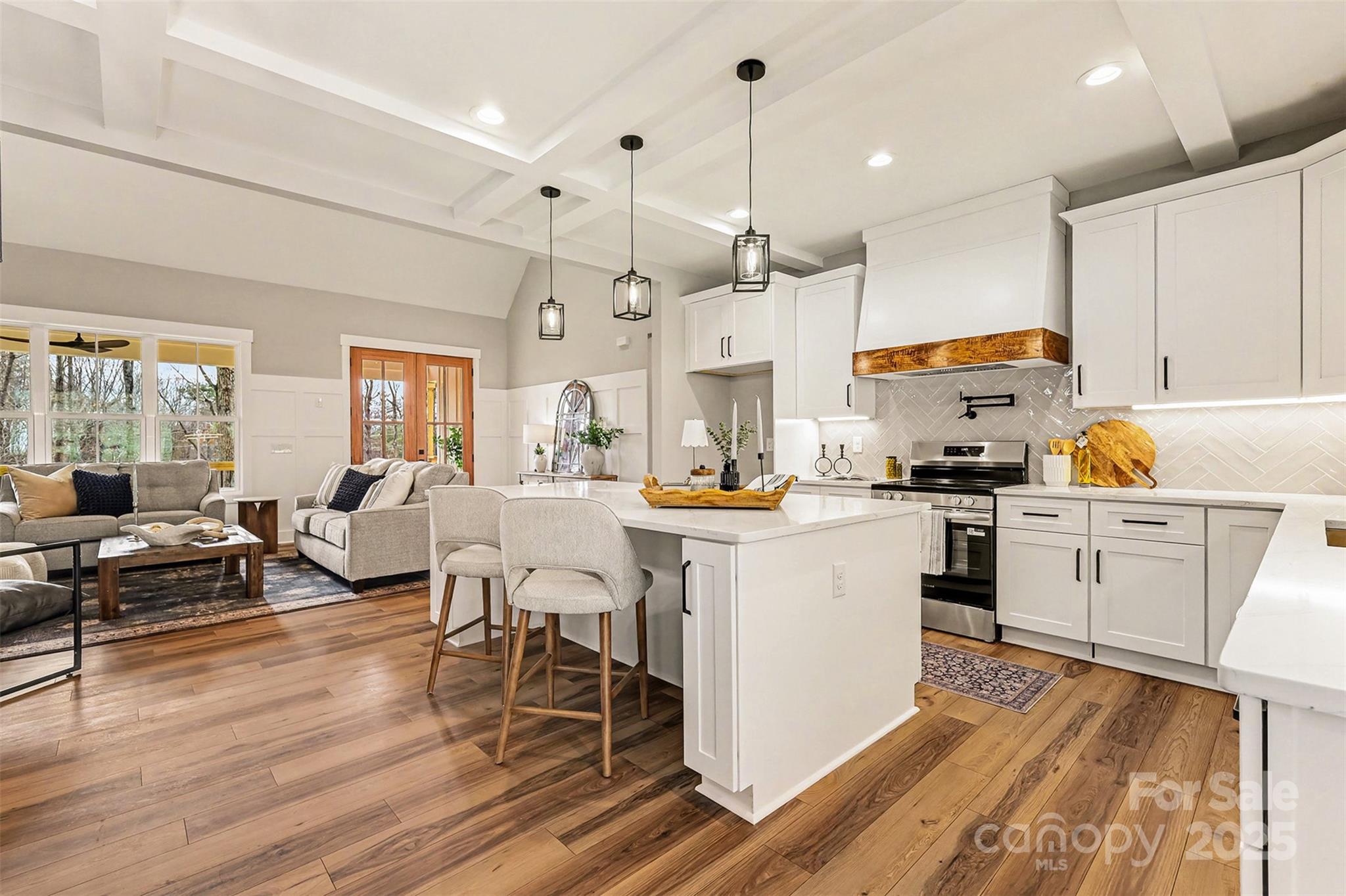 5304 West Liberty Hill Road York, SC 29745 - Photo 12 of 41 a kitchen with white cabinets and stainless steel appliances