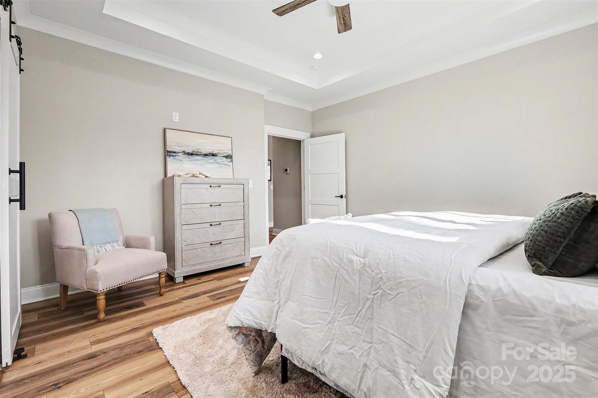 5304 West Liberty Hill Road York, SC 29745 - Photo 16 of 41 a bedroom with a bed and a chair