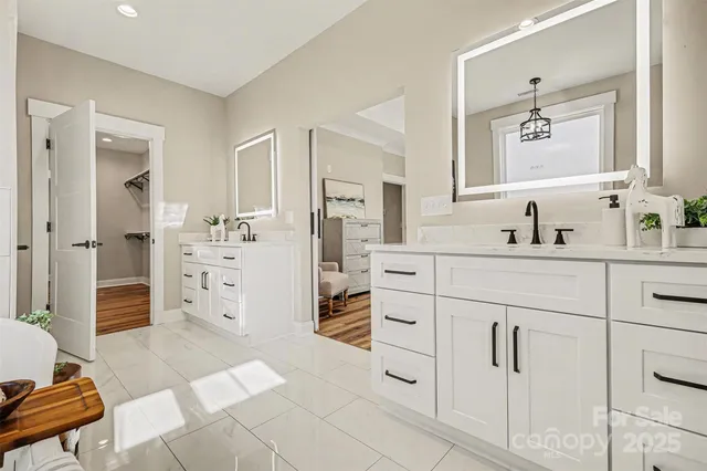 a bath room with a sink and a fireplace