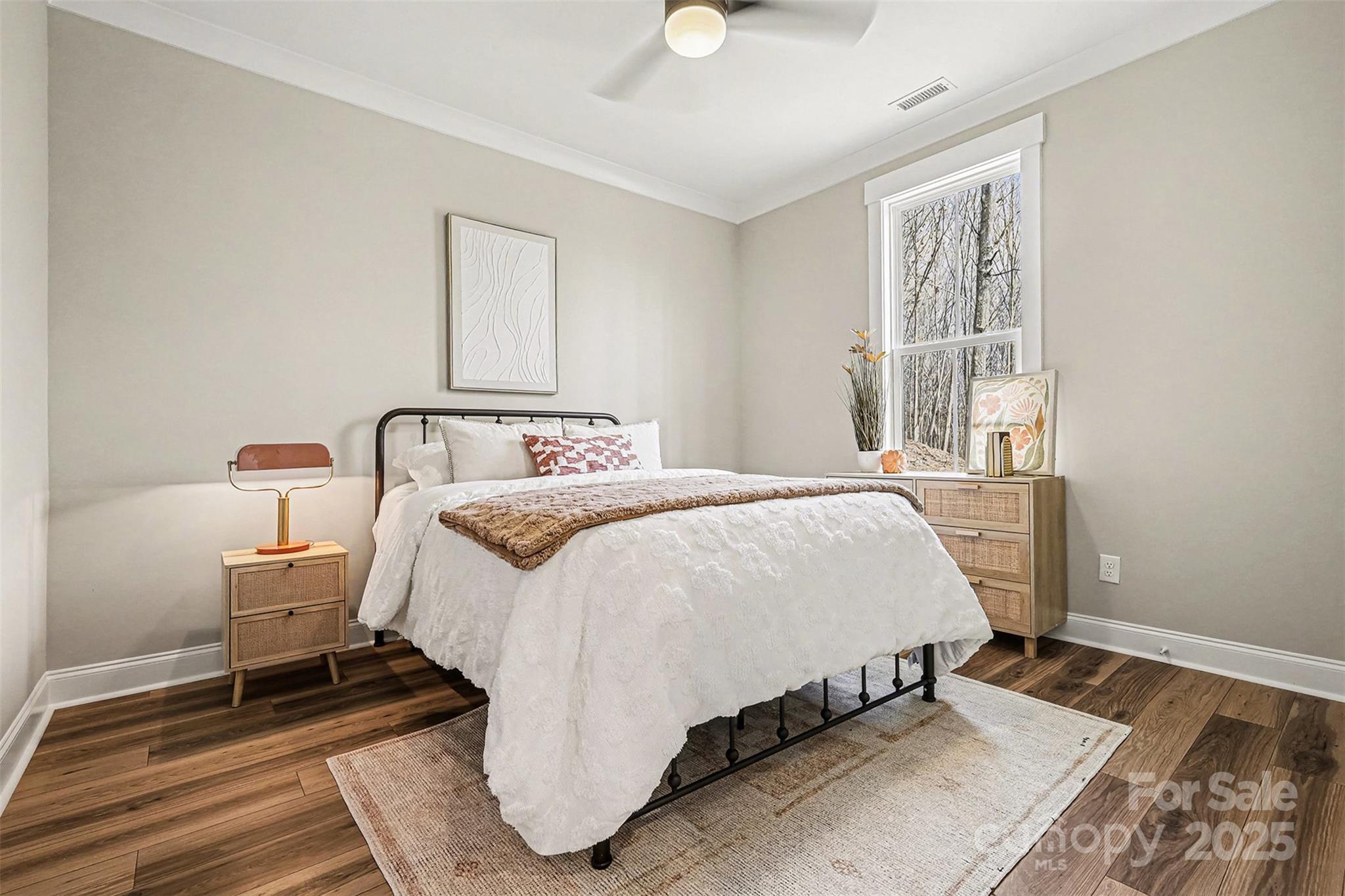 5304 West Liberty Hill Road York, SC 29745 - Photo 24 of 41 a bedroom with a bed and wooden floor
