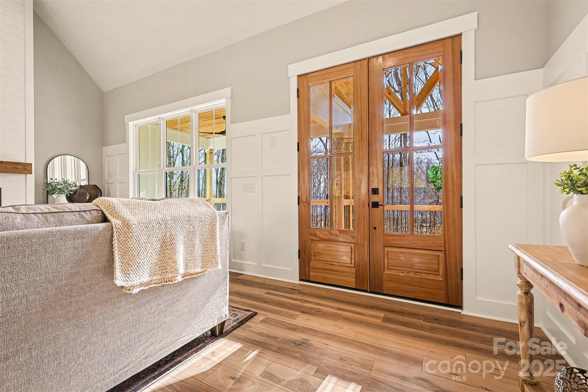 5304 West Liberty Hill Road York, SC 29745 - Photo 3 of 41 a bedroom with a balcony a bed and a dresser next to a window