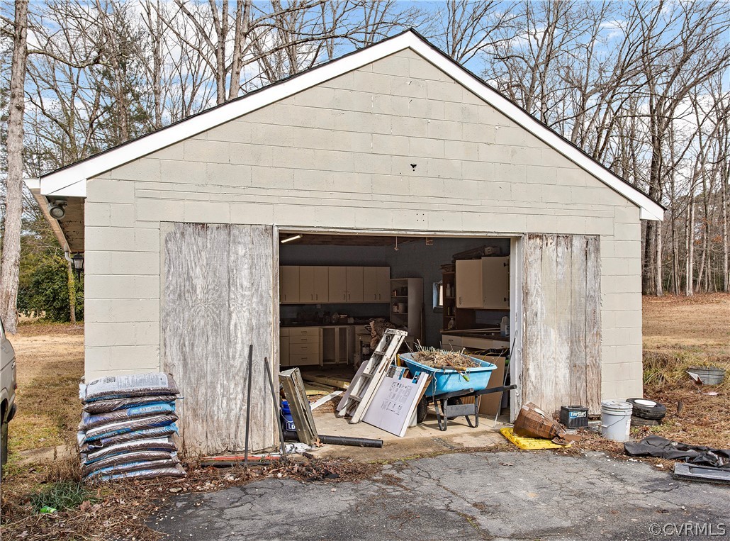 13007 Lewis Road Chester, VA 23831 - Photo 36 of 37 Exterior view of one car garage