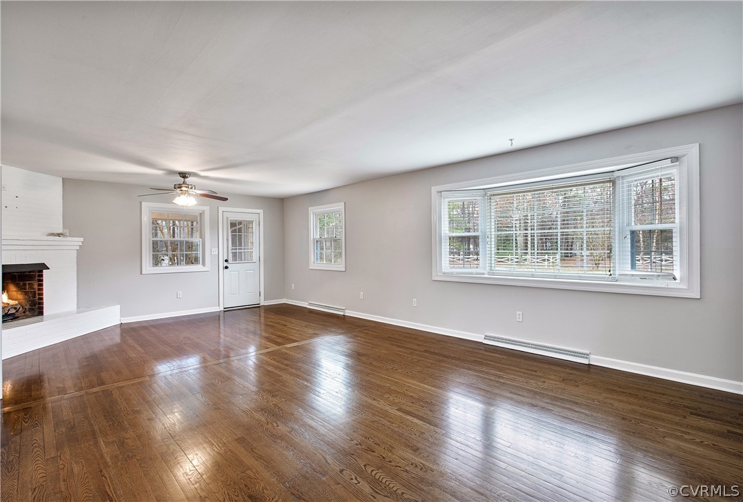 13007 Lewis Road Chester, VA 23831 - Photo 6 of 37 Family room with view of WBFP and entry to screene