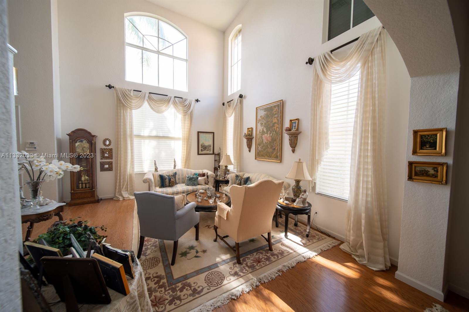 3961 Nighthawk Drive Weston, FL 33331 - Photo 12 of 35 a view of a dining room with furniture window and wooden floor