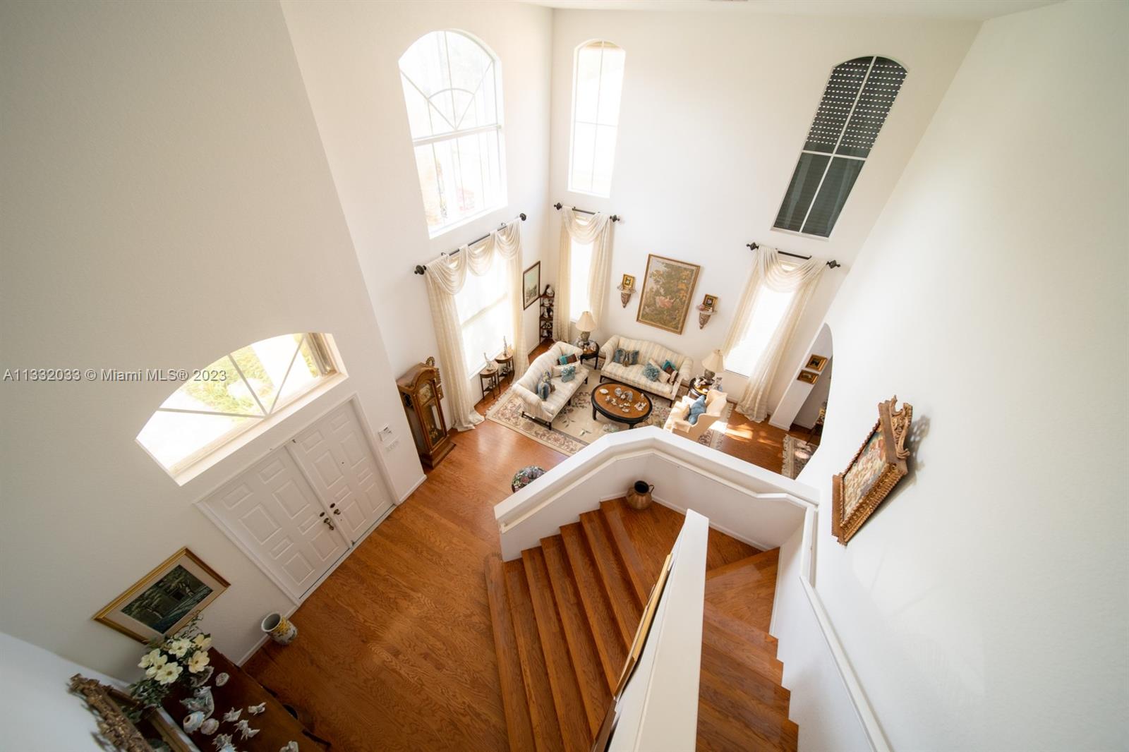3961 Nighthawk Drive Weston, FL 33331 - Photo 15 of 35 walk in closet with wooden floor and windows