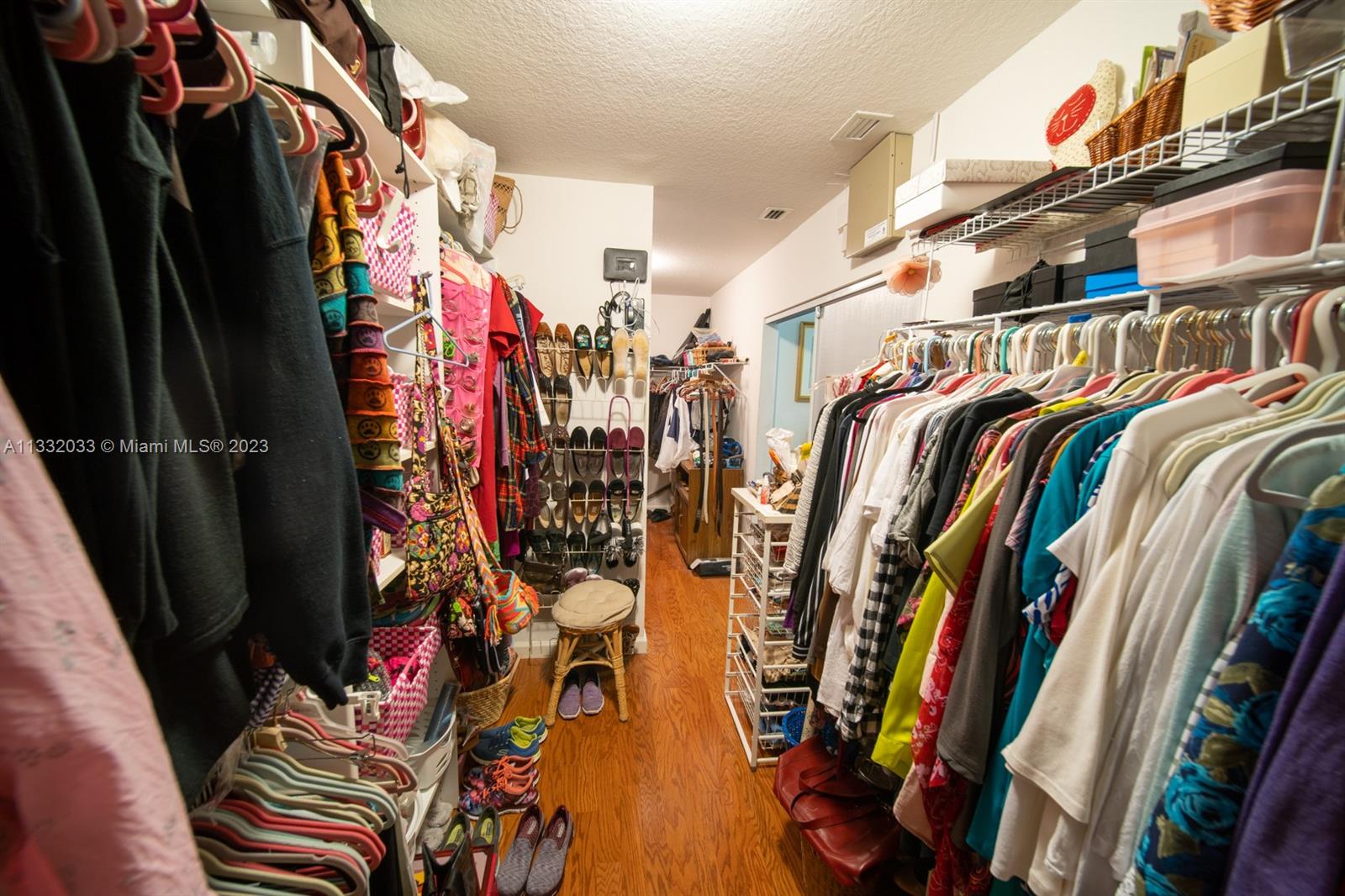 3961 Nighthawk Drive Weston, FL 33331 - Photo 26 of 35 a view of walk in closet with clothes