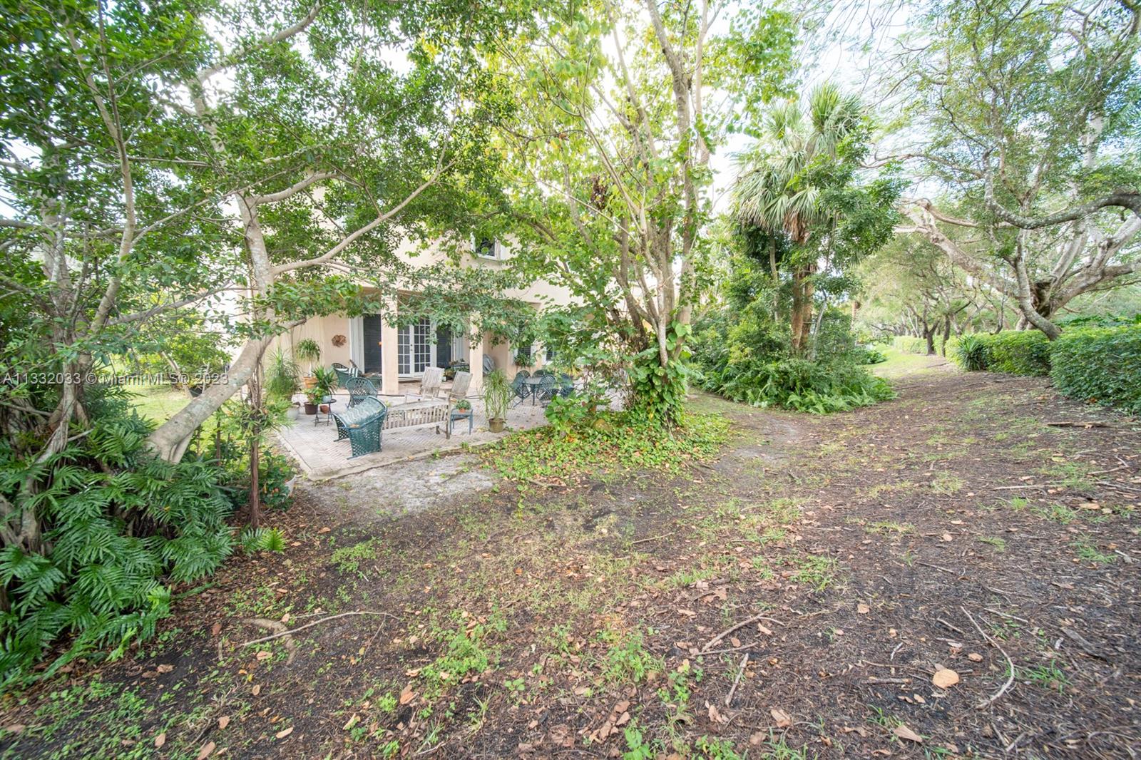 3961 Nighthawk Drive Weston, FL 33331 - Photo 27 of 35 a front view of a house with a yard
