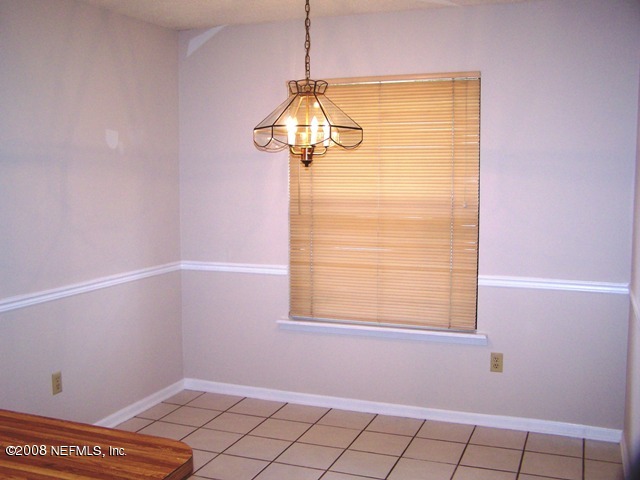 11036 Reading Road Jacksonville, FL 32257 - Photo 13 of 22 a bathroom with a window