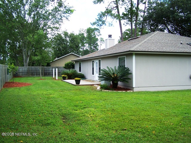 11036 Reading Road Jacksonville, FL 32257 - Photo 5 of 22 a front view of house with yard and green space