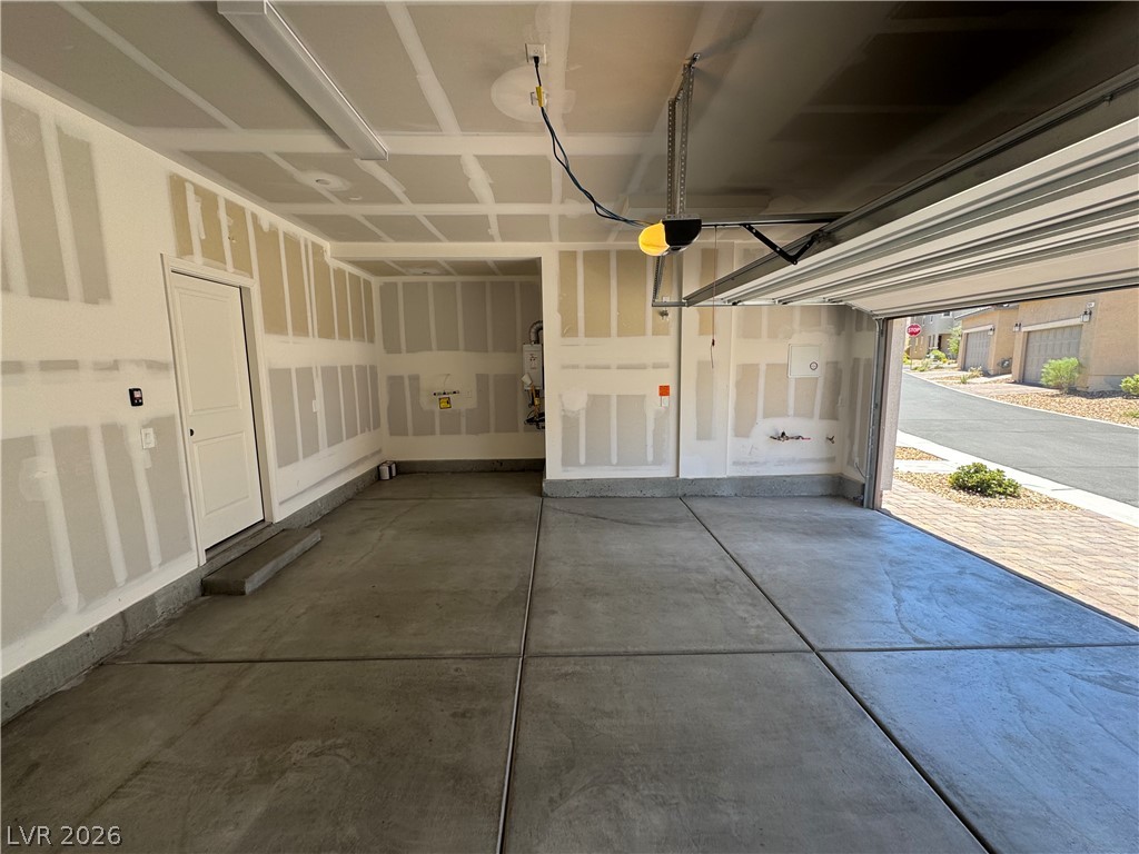 2821 Alcobaca Street Henderson, NV 89044 - Photo 10 of 24 Secure parking and ample storage await in this functional, well-lit garage space.
