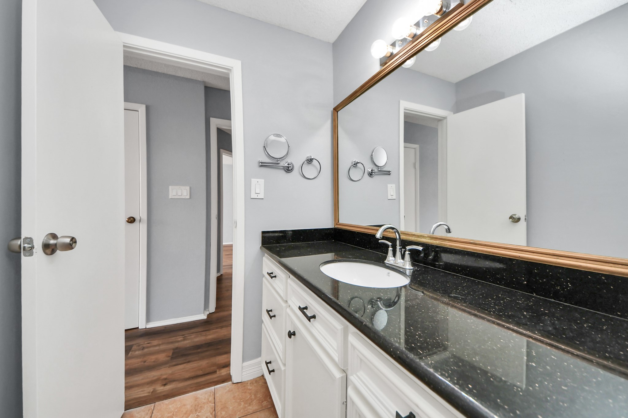 6601 Sands Point Drive, Unit 30 Houston, TX 77074 - Photo 20 of 29 a bathroom with a sink and a mirror