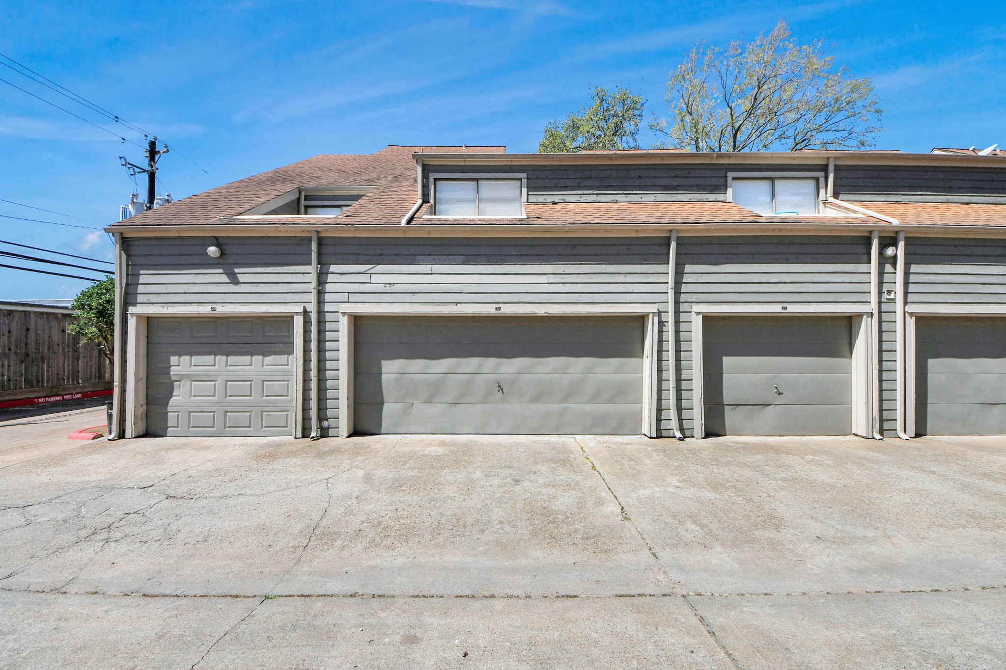 6601 Sands Point Drive, Unit 30 Houston, TX 77074 - Photo 25 of 29 a view of a house with a garage