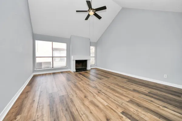 a kitchen with stainless steel appliances granite countertop a sink and a stove