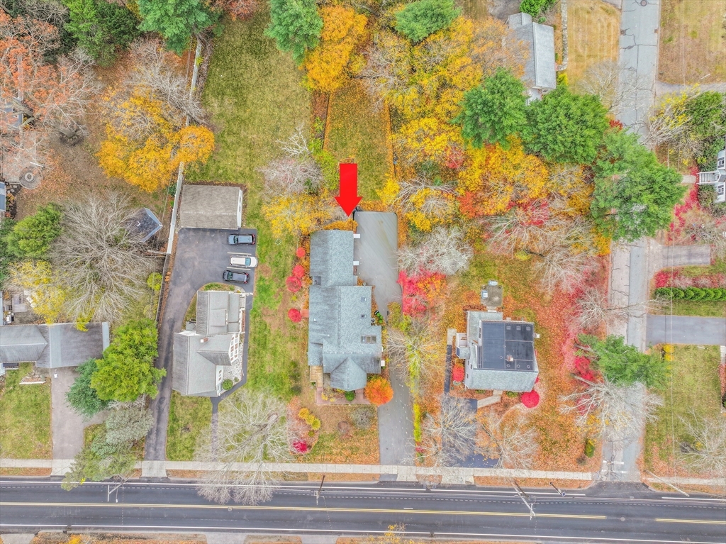 486 Washington Street Walpole, MA 02032 - Photo 17 of 17 a bird view of building and tree in the background