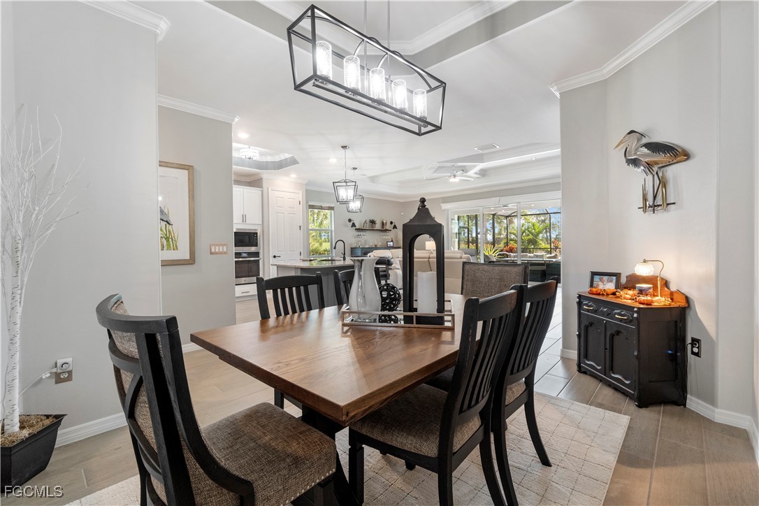 43276 Boardwalk Loop Punta Gorda, FL 33982 - Photo 13 of 50 a dining room with furniture and window