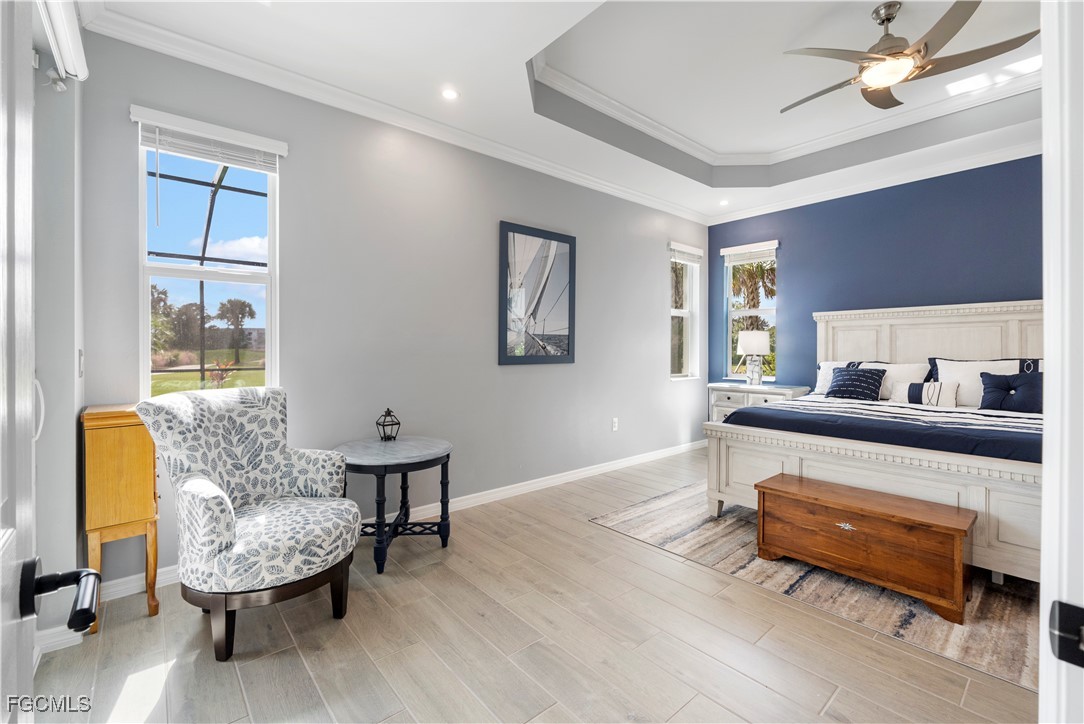43276 Boardwalk Loop Punta Gorda, FL 33982 - Photo 19 of 50 a living room with furniture and a wooden floor