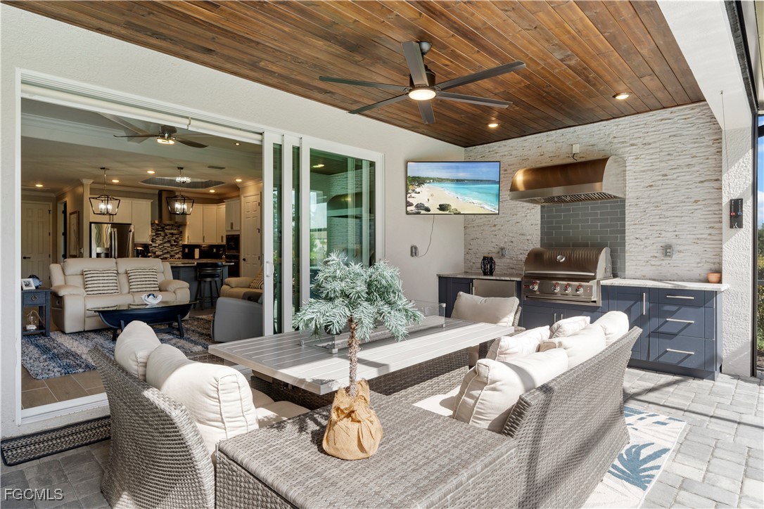 43276 Boardwalk Loop Punta Gorda, FL 33982 - Photo 29 of 50 a living room with furniture and a fireplace