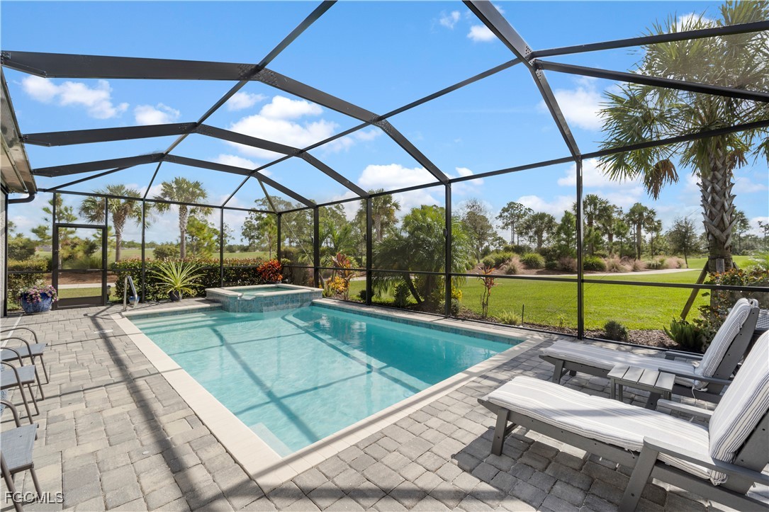 43276 Boardwalk Loop Punta Gorda, FL 33982 - Photo 30 of 50 a view of outdoor space with swimming pool