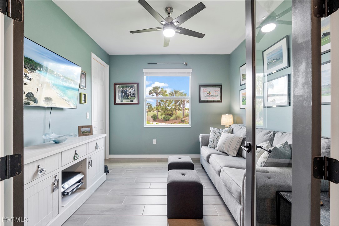 43276 Boardwalk Loop Punta Gorda, FL 33982 - Photo 8 of 50 a bedroom with furniture and a chandelier