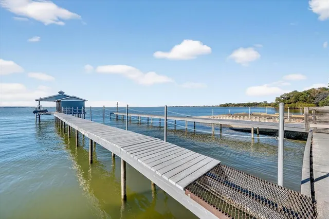 a view of a balcony with wooden floor