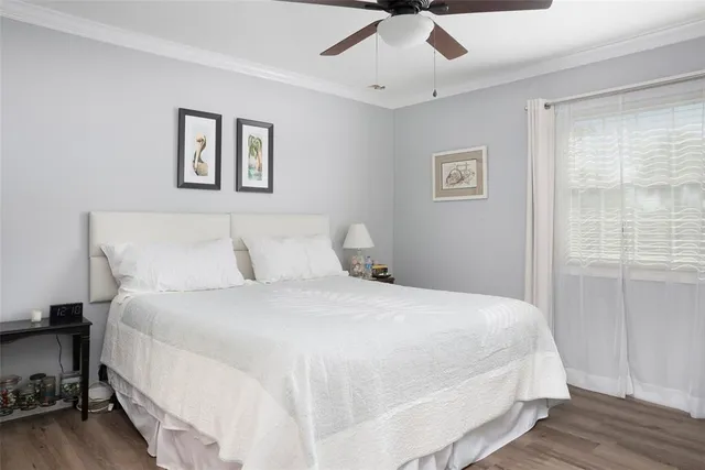 a large white bed in a white room