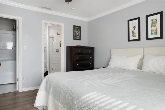 a bedroom with a bed and a closet