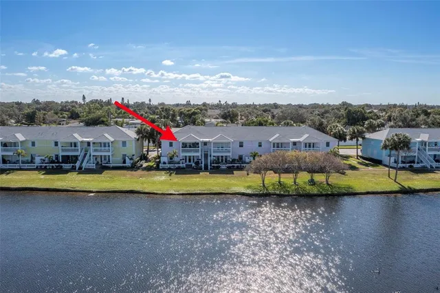 a view of houses with swimming pool and mountains