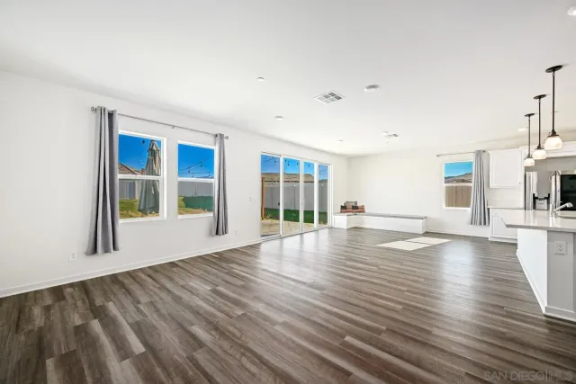 a spacious bathroom with a tub shower vanity and a sink