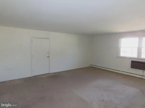 an empty room with a window