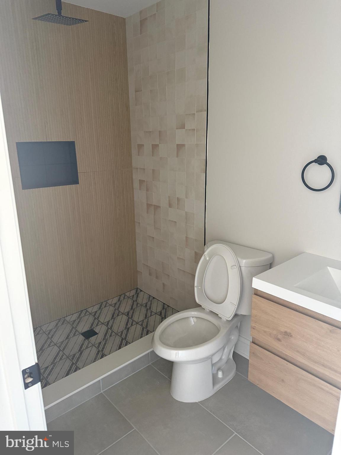 535 Princess Avenue Croydon, PA 19021 - Photo 11 of 14 a white toilet sitting next to a shower