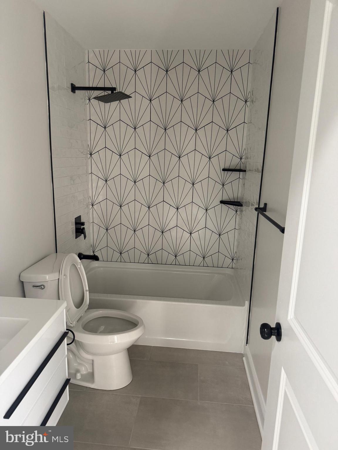 535 Princess Avenue Croydon, PA 19021 - Photo 12 of 14 a bathroom with a toilet and a bathtub