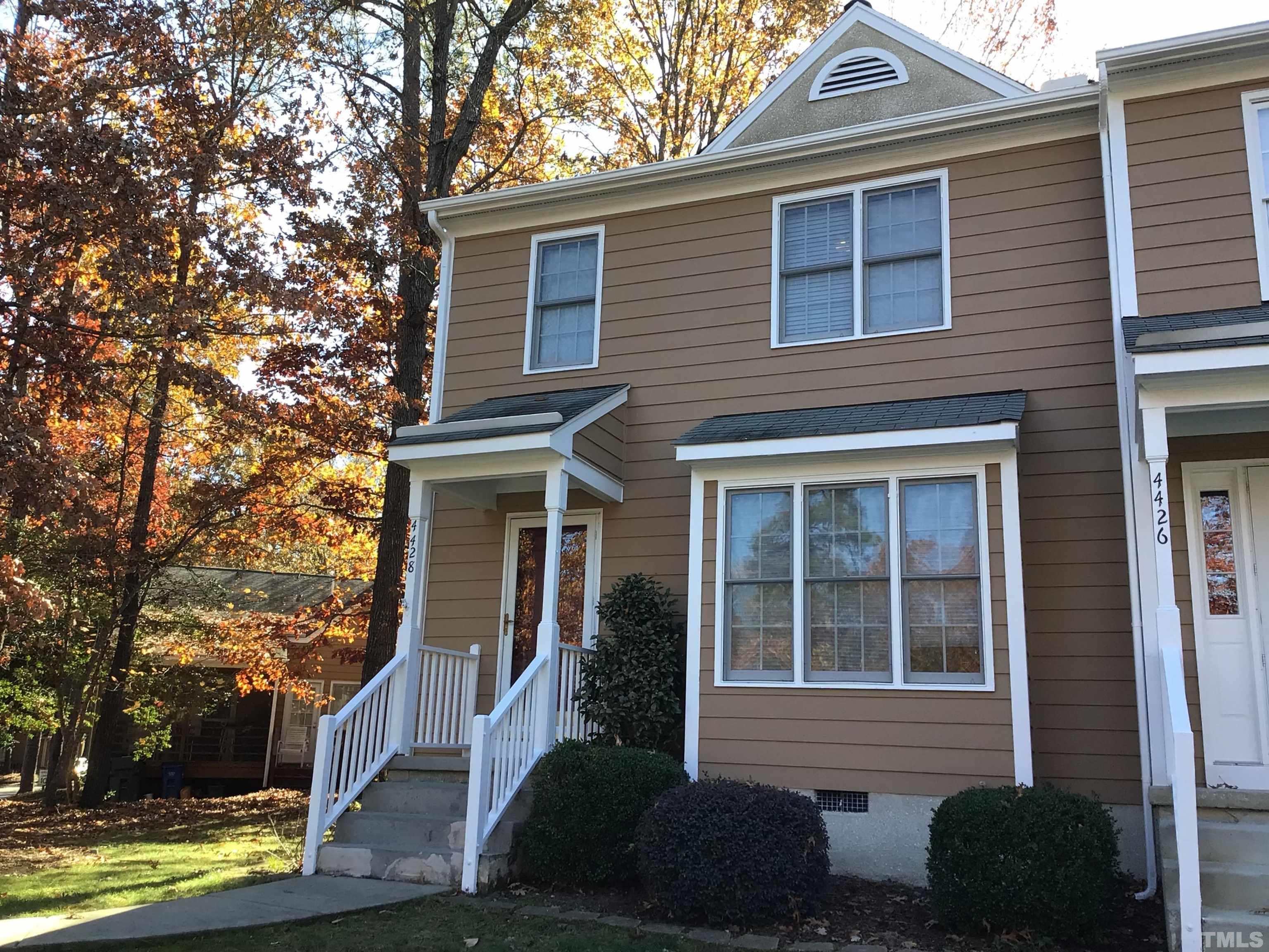 4428 Antique Lane Raleigh, NC 27616 - Photo 2 of 30 a front view of a house with garden