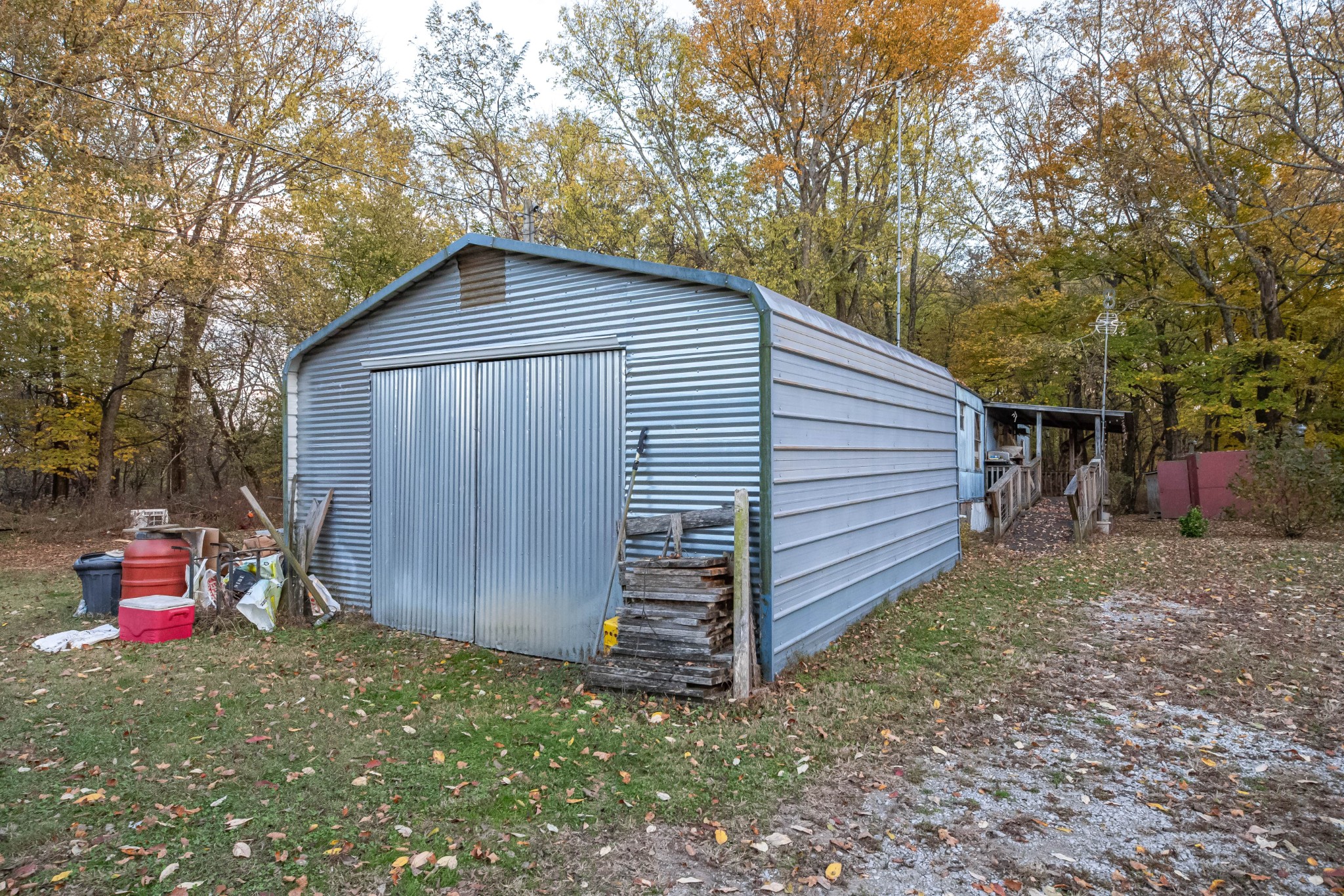 1916 Mack Benderman Road Culleoka, TN 38451 - Photo 59 of 61 a backyard of a house with wooden fence and trees