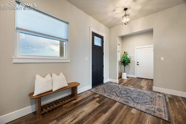 a bedroom with bed and window