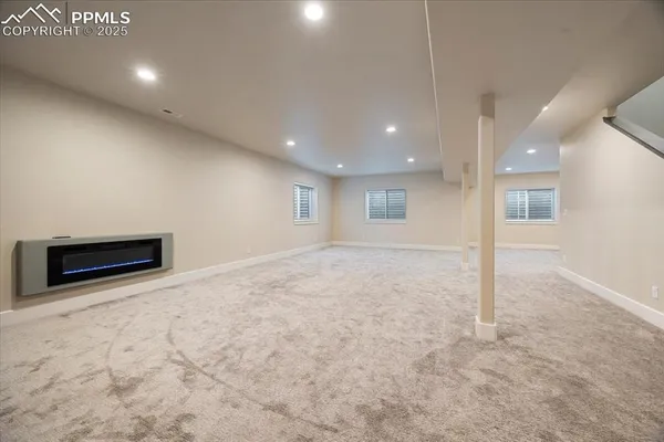 a view of an empty room with a stove