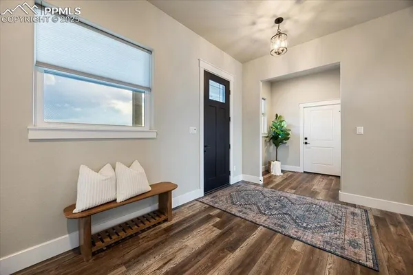 a bedroom with bed and window