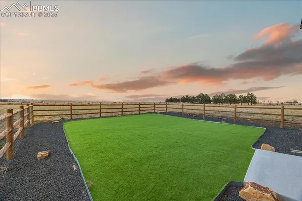 a view of a golf course with a garden