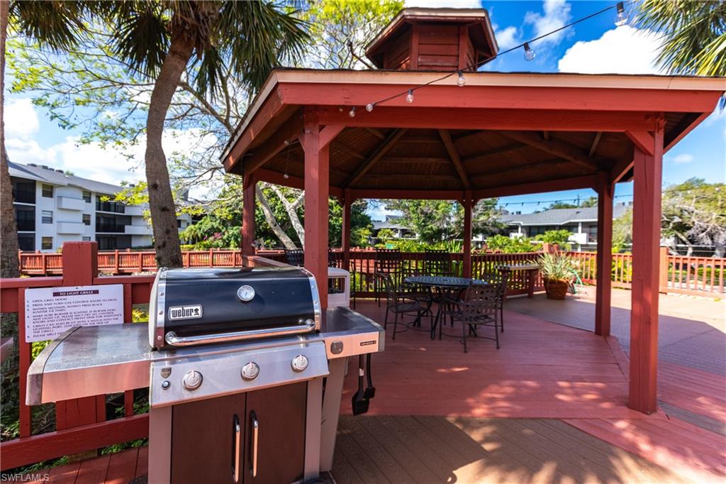 600 Neapolitan Way, Unit 152 Naples, FL 34103 - Photo 34 of 41 a view of outdoor space yard and patio